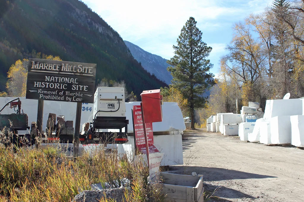 Entrance to the historic Marble Mill site with marble blocks