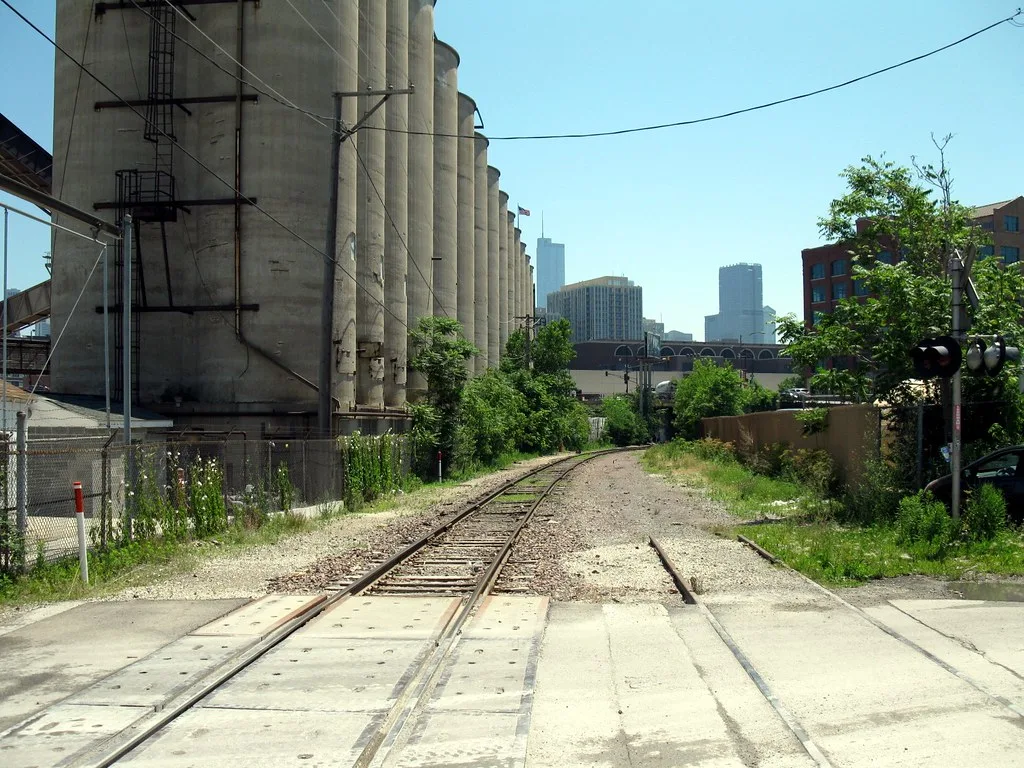 Union Pacific Low Line tracks at Peoria Street alongside silos in Chicago.