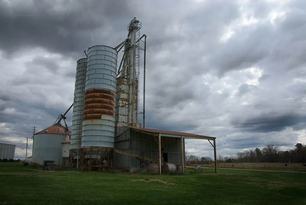 Old NC State silo under a cloudy sky