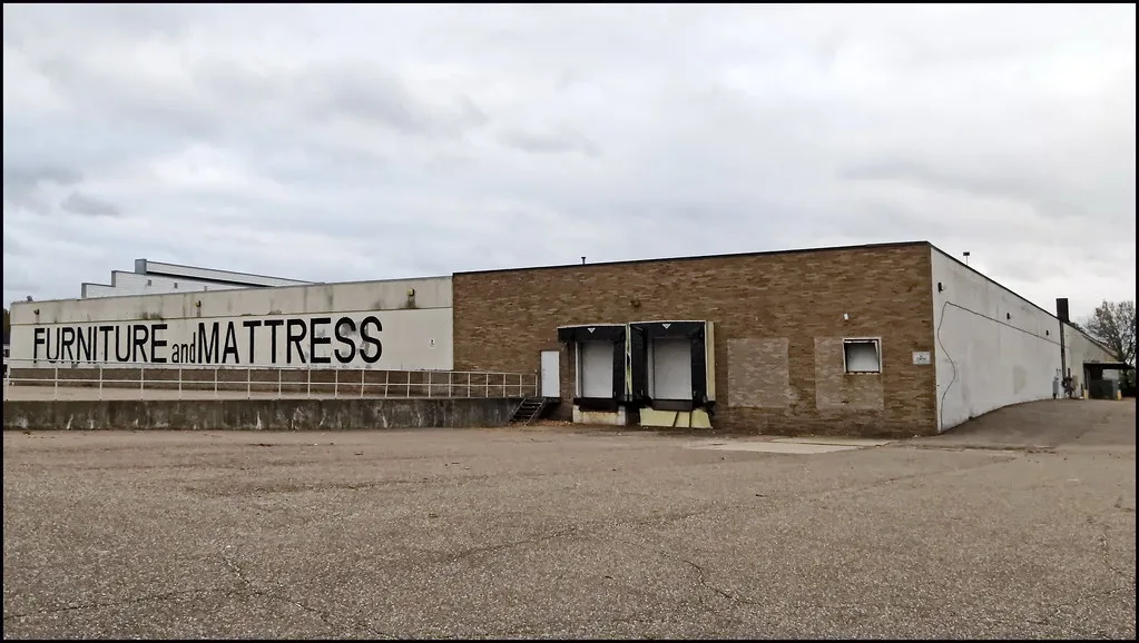 Furniture and mattress warehouse with two loading bays.