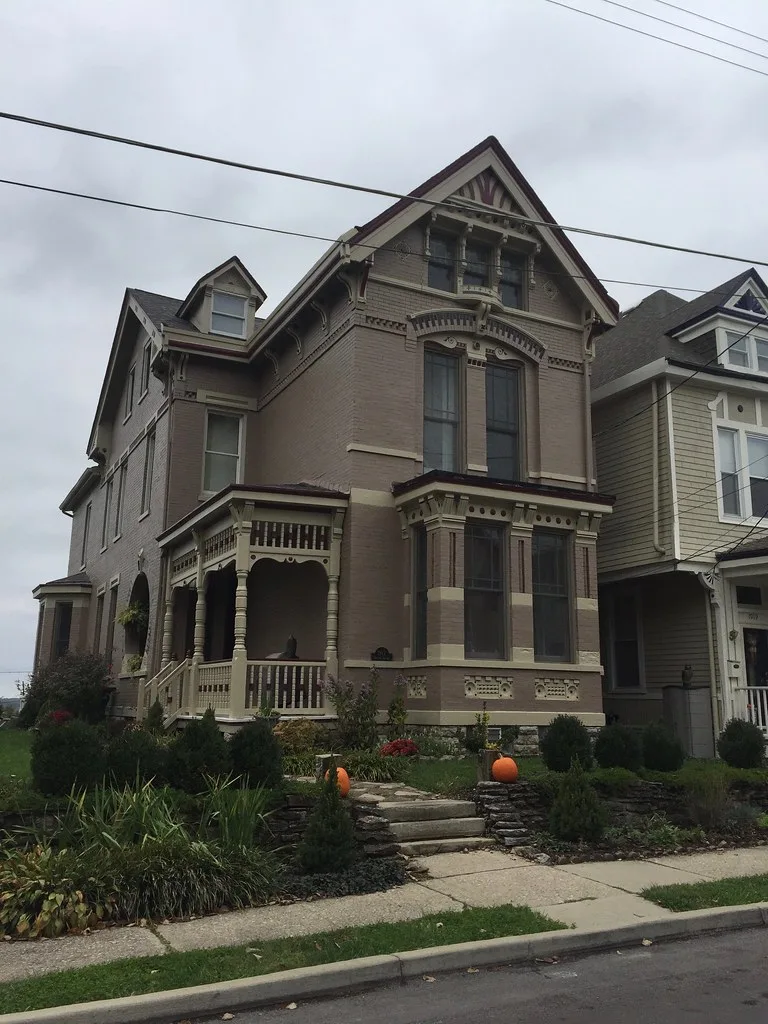 Victorian house with an ornate porch on Bigelow Street in Cincinnati