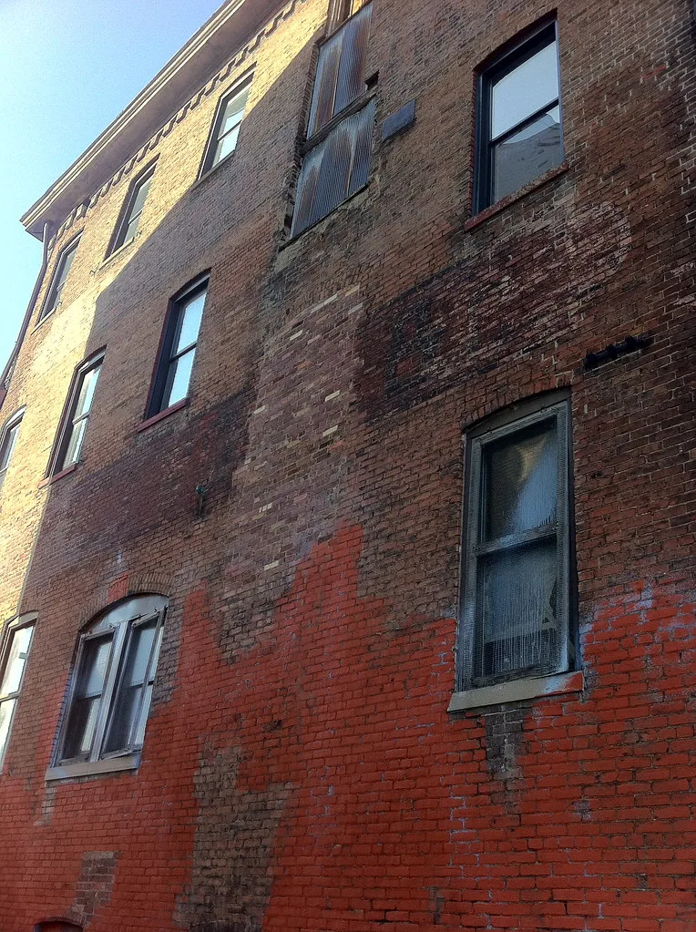 Brick facade of an old building in Smoketown