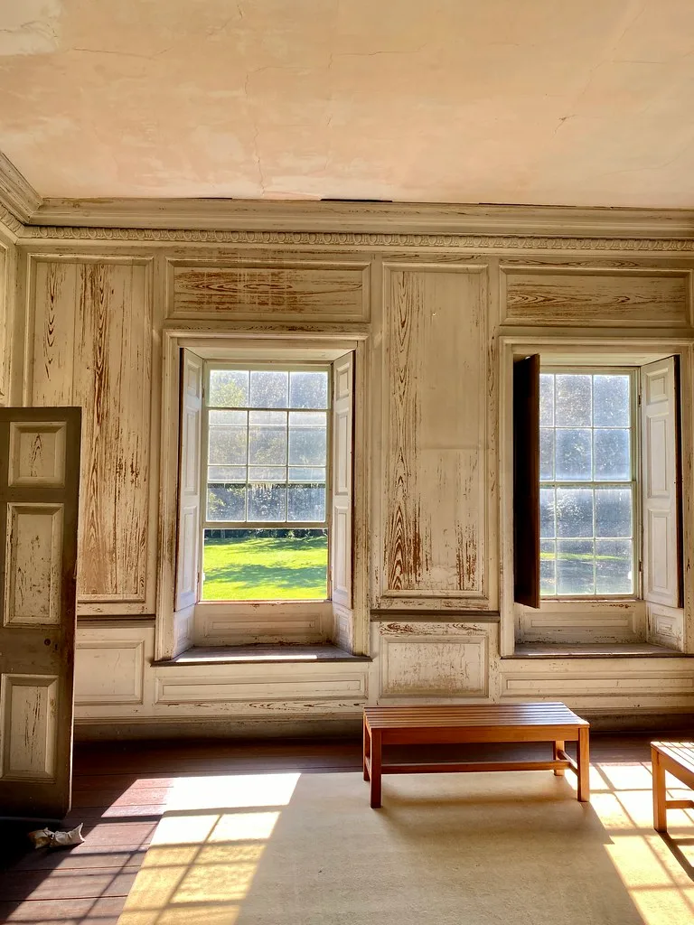 Windows and old wood paneling in the library at Drayton Hall.