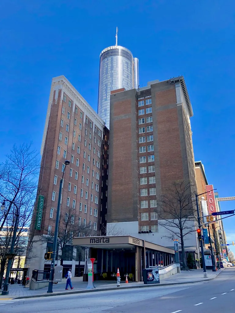 Carnegie Building and the former Winecoff Hotel on an Atlanta street.
