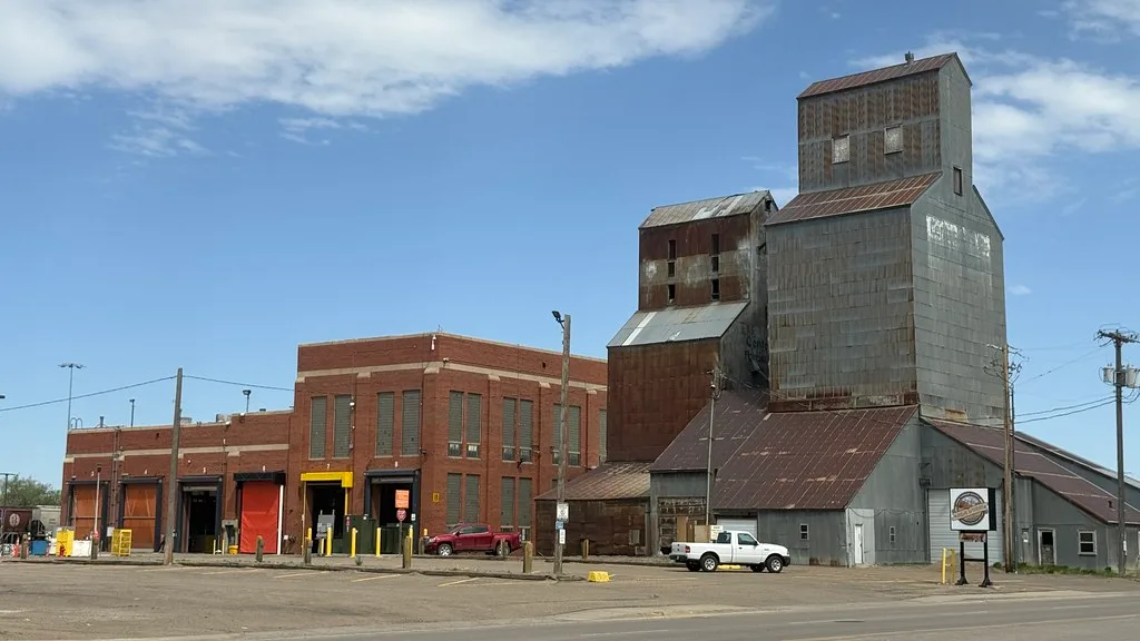Old grain elevator and brick railway workshop in Havre.