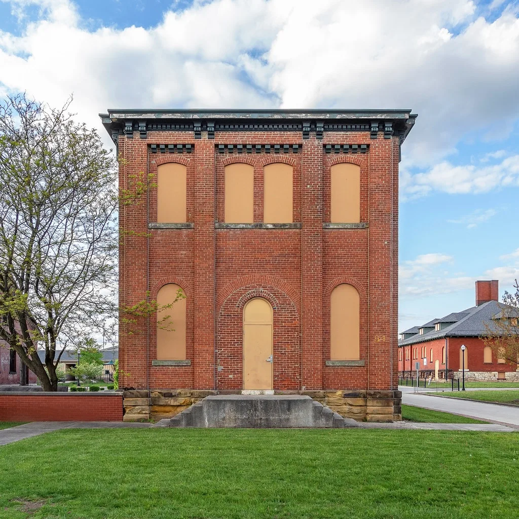Brick building at Fort Hayes with blocked openings.