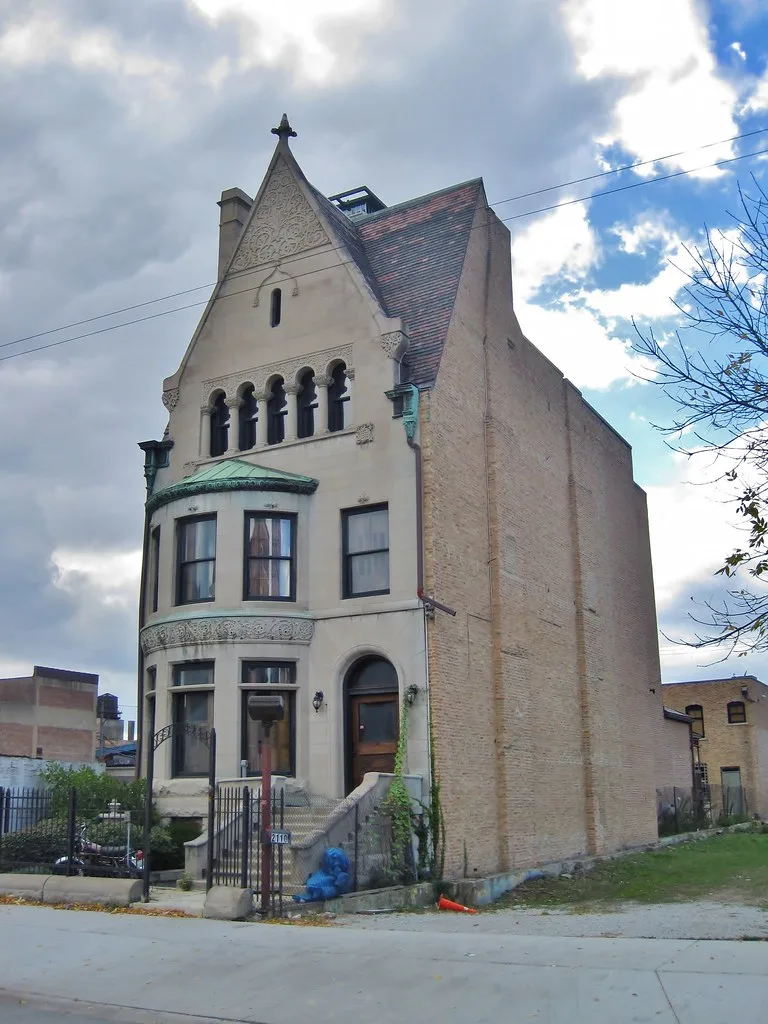 Harriet F. Rees House in Chicago with its tall gable and rounded bay.