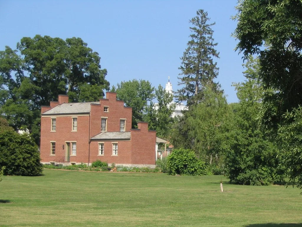 Brick house with stepped gables in Nauvoo's historic district.