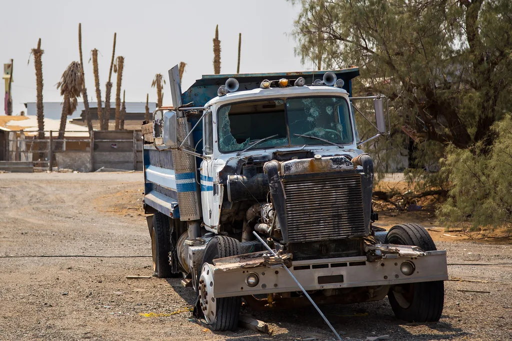 Truck wreck on a plot in Baker, California