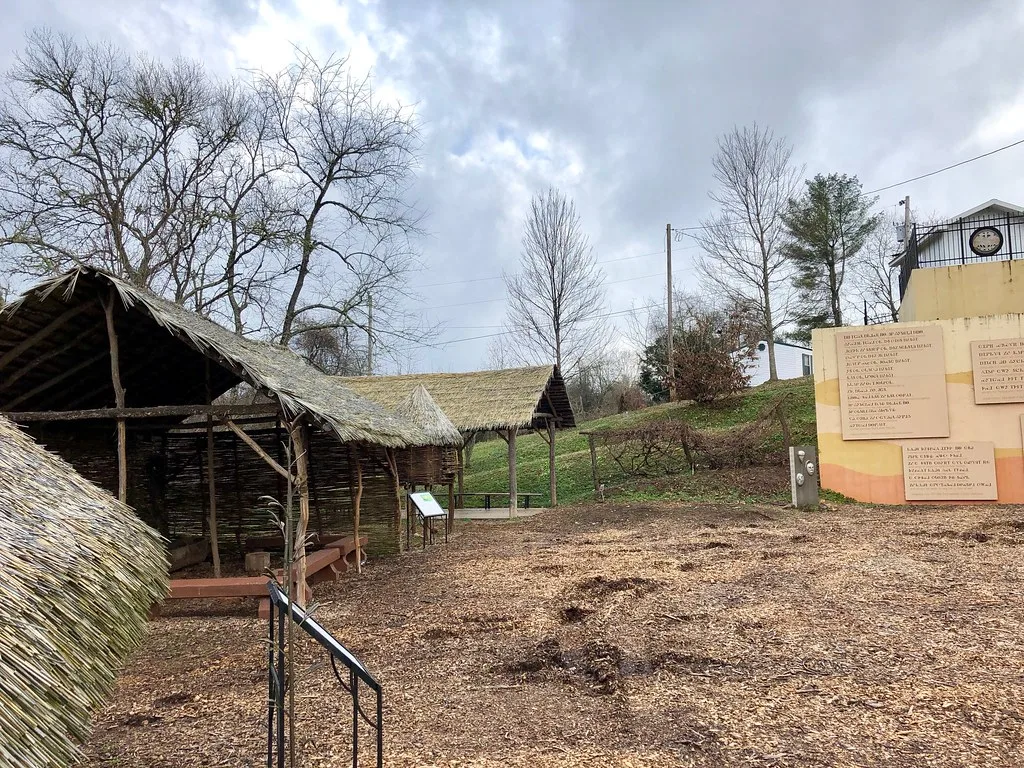 Thatched structures at the Cherokee Homestead Exhibit in Hayesville.