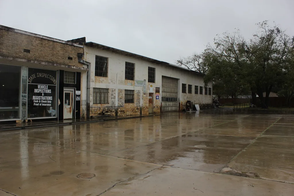 Old workshops in the rain in Yorktown, Texas