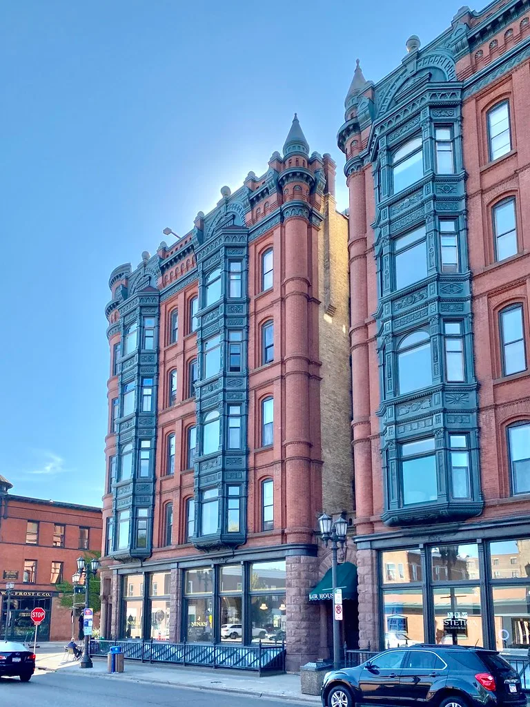 Blair Flats facade in Saint Paul with projecting bays and turrets.