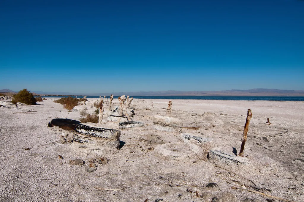 Remains of structures on the dry shore of the Salton Sea