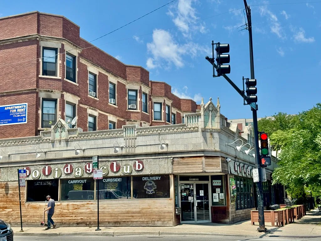 Older building and ornamented storefronts at Sheridan Road and Irving Park Road in Chicago.