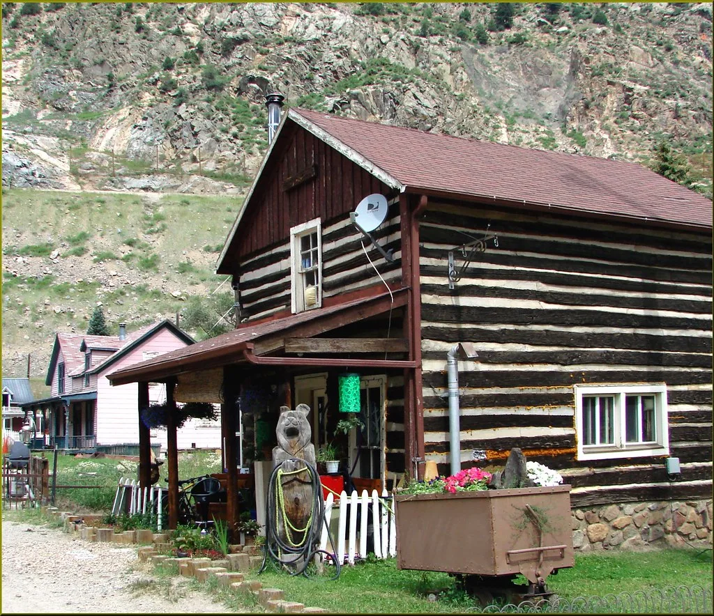 Log house and decorative mining cart in Georgetown, Colorado
