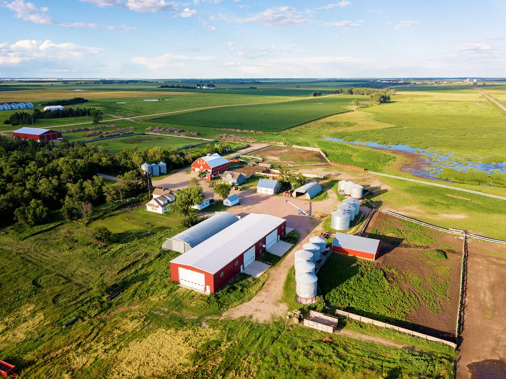 Aerial view of the red barns and silos at the Thorstenson homestead.