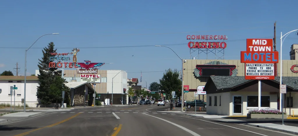 Street in Elko, Nevada, lined with motels and a casino.