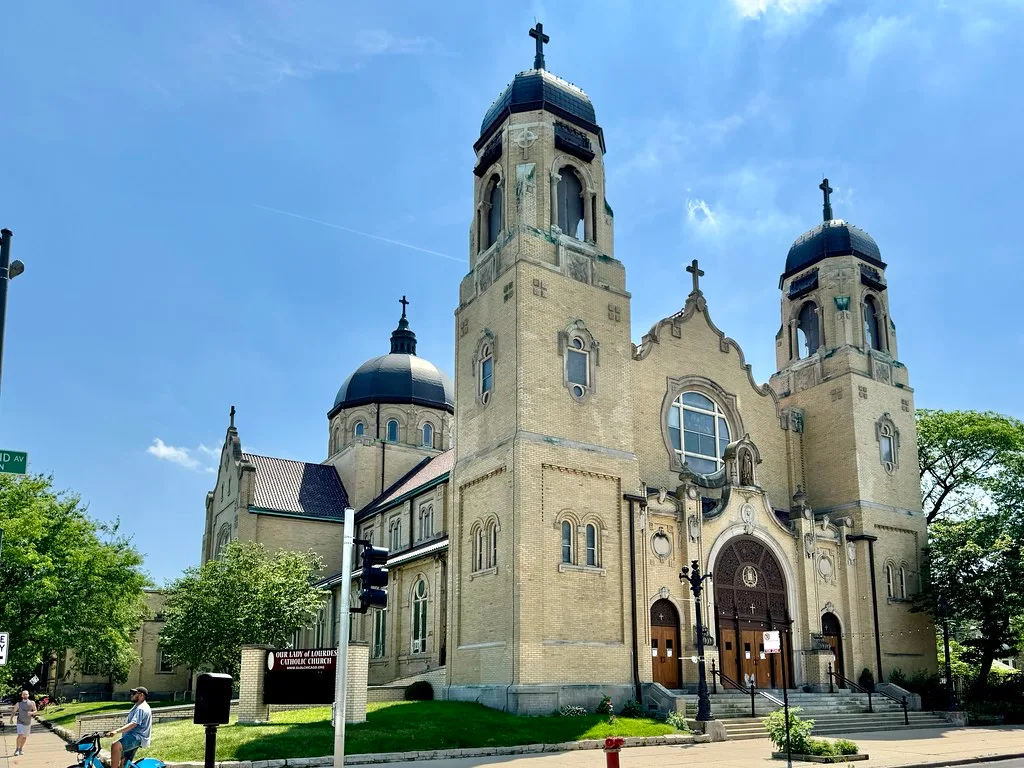 Our Lady of Lourdes Church in Chicago with twin towers and a dome.